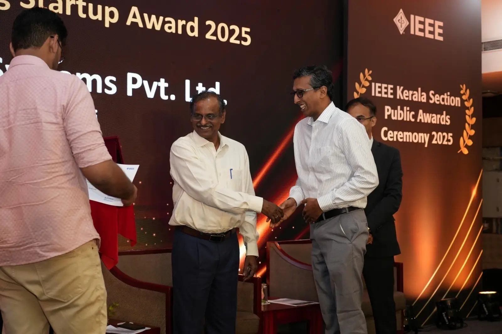 Handshake ceremony at IEEE Kerala Section Awards